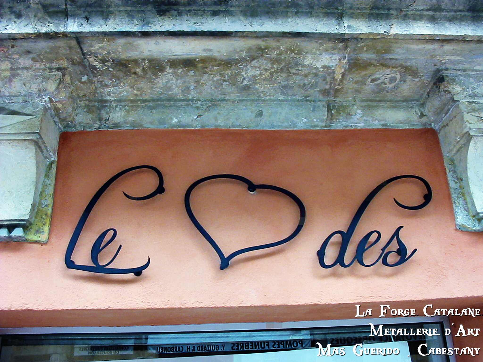 enseigne le coeur des hommes decoupe au laser perpignan forge catalane.jpg